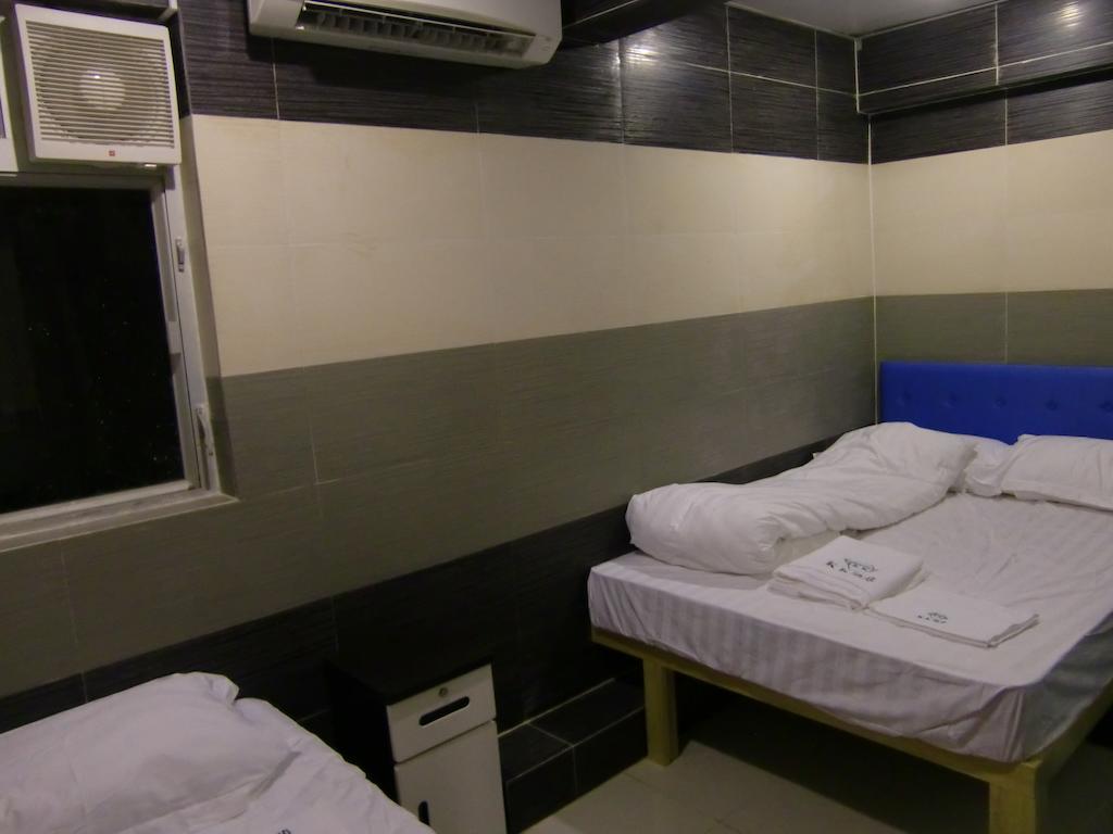 Kk Guesthouse Hongkong Szoba fotó